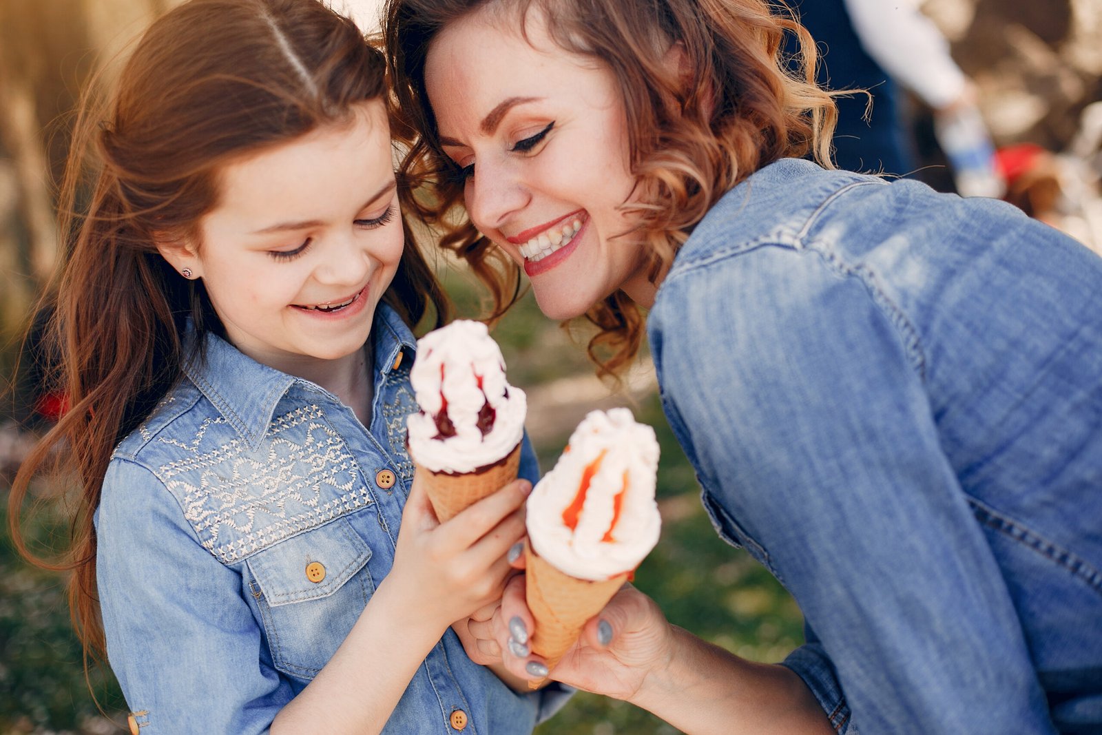 A mother and daughter enjoying ice cream together
