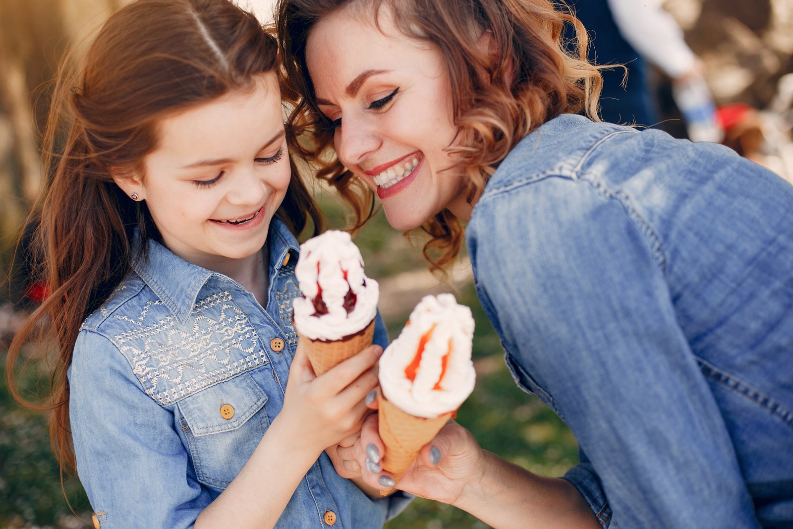 A mother and daughter enjoying ice cream together